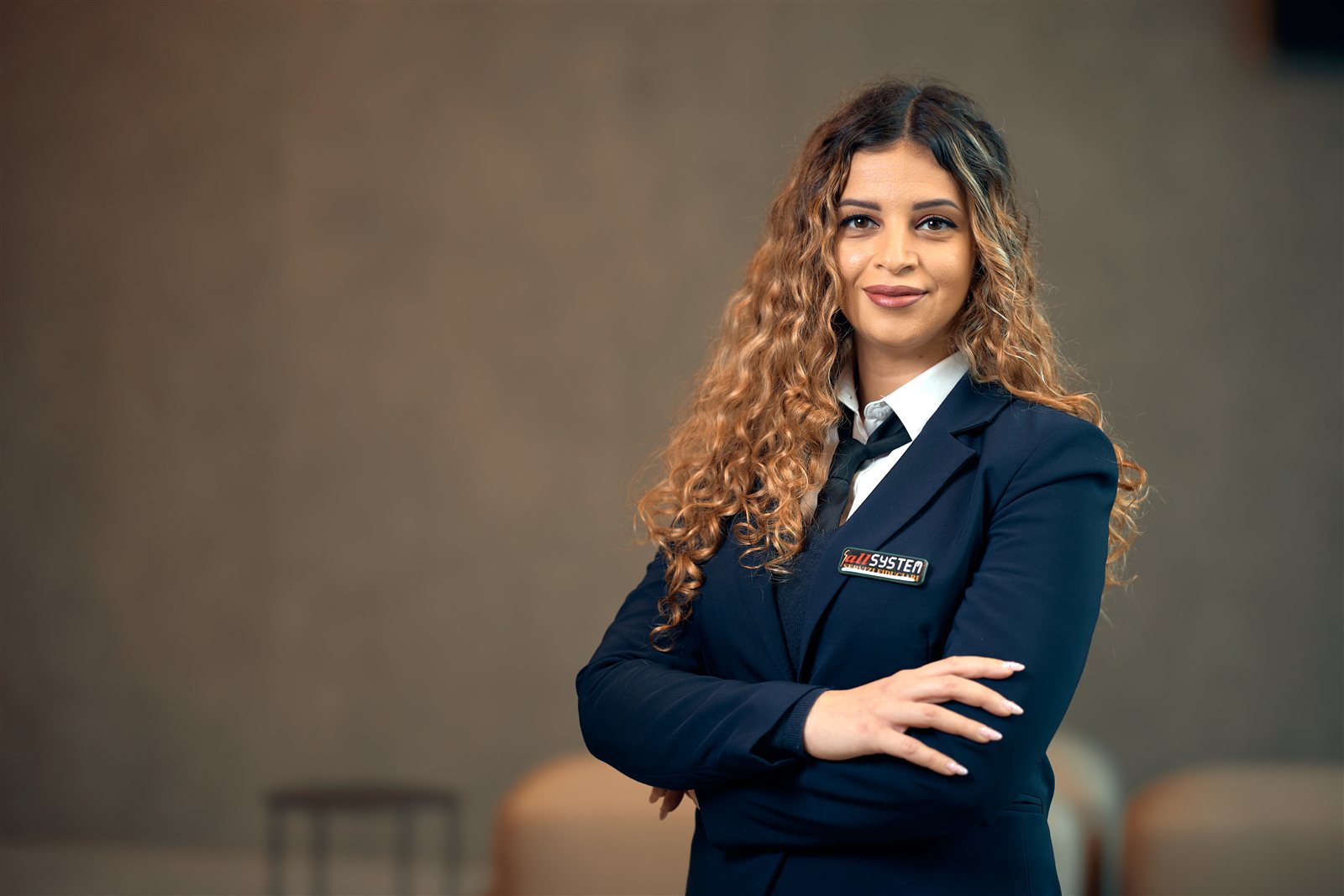 Una collega Allsystem in divisa